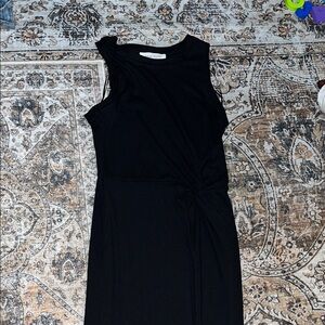 Sleeveless dress with slit